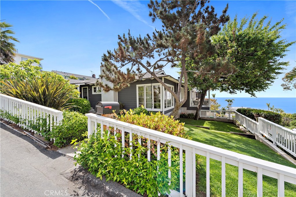 Single level Craftsman design on a 7,500 sq ft flat view lot with enclosed yard and gardens - 1025 Capistrano Avenue, Laguna Beach CA 92651 - photo 1