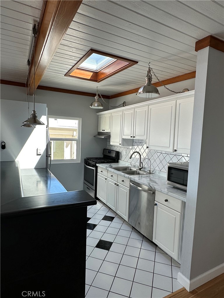 Kitchen with newer appliances, sunroof and views to ocean - 1064 Santa Ana, Laguna Beach CA 92651 - photo 4