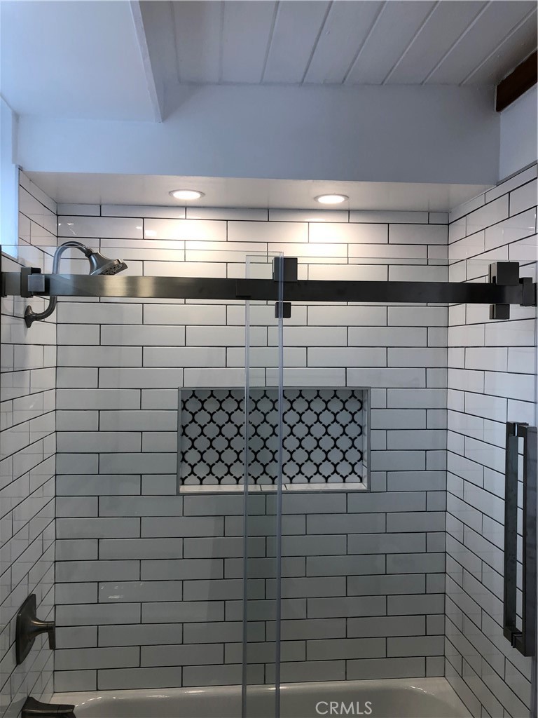 Main level bathroom with beautiful tile work in shower - 1064 Santa Ana, Laguna Beach CA 92651 - photo 10