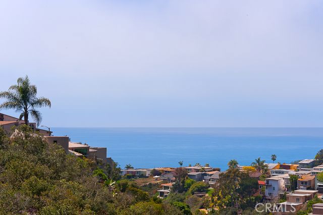 Home backs to canyon setting with an ocean view from both levels! - 1065 Santa Ana Street, Laguna Beach CA 92651 - photo 1