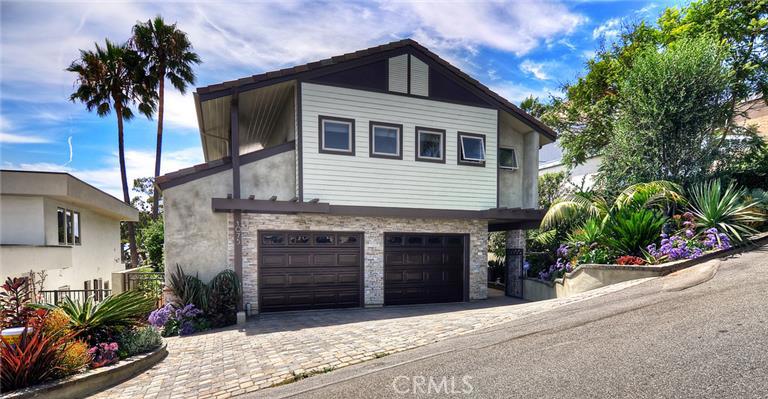 Rare double-lot home has curb appeal and tile roof plus two car garage and driveway - 1075 Noria Street, Laguna Beach CA 92651 - photo 1
