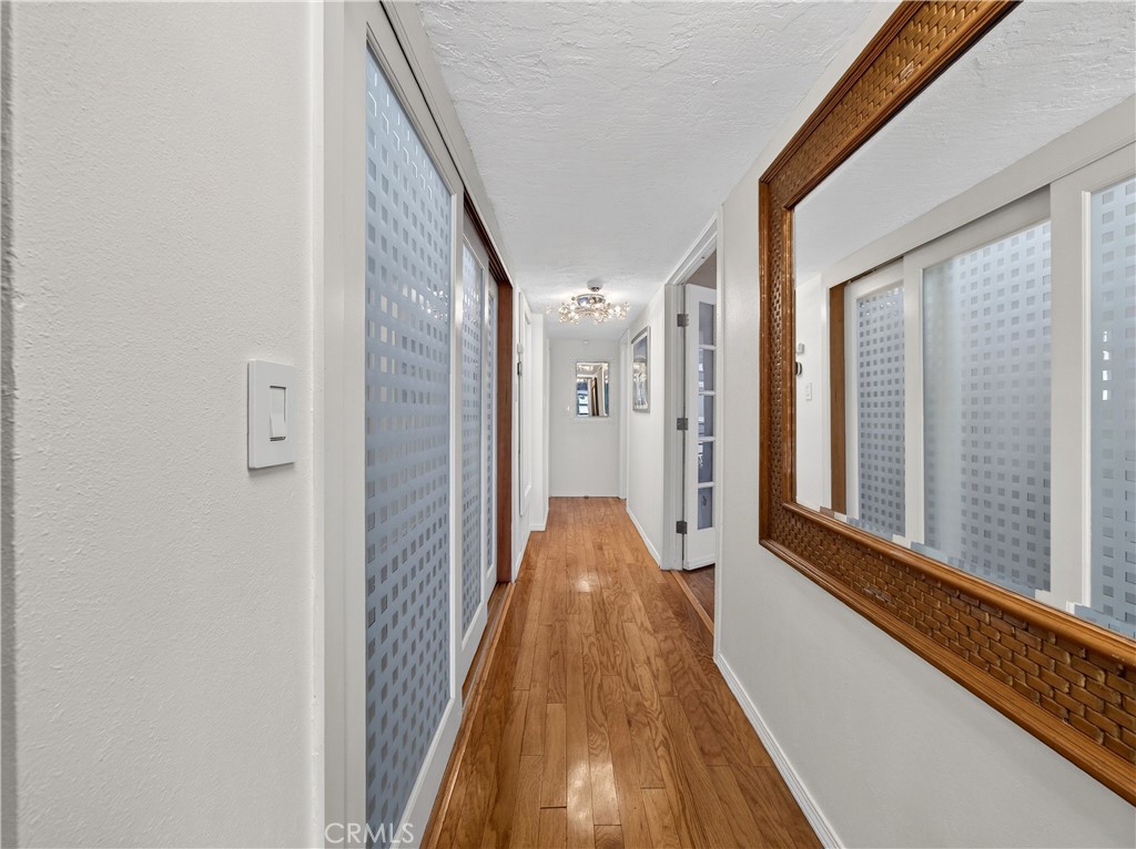 Long Hallways leading to bedroom and side yard - 1080 Noria, Laguna Beach CA 92651 - photo 5