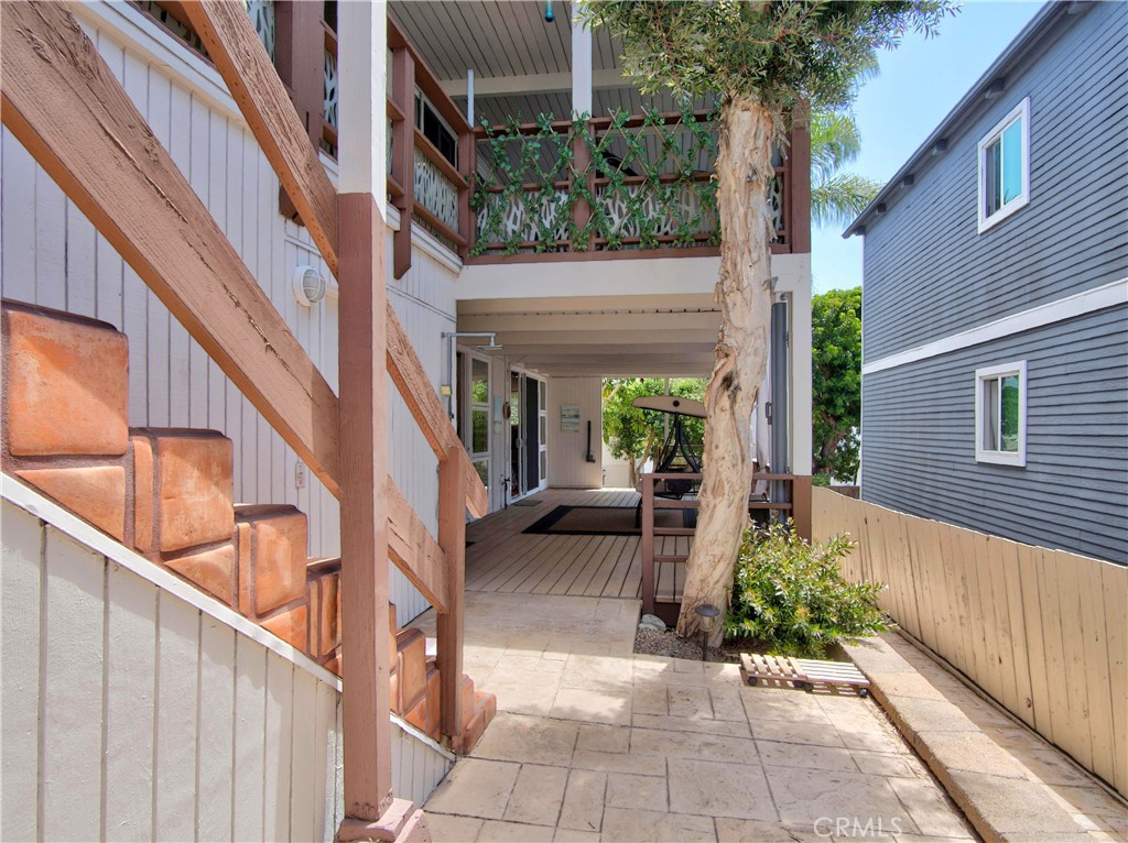 Side stairs outside provide access to either frontyard or backyard and Patio - 1080 Noria, Laguna Beach CA 92651 - photo 11