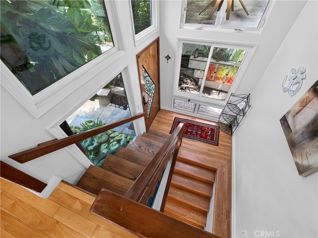 A view of the Double stairs providing easy access to all patios and entrance to upstairs and down stairs - 1080 Noria, Laguna Beach CA 92651 - photo 17