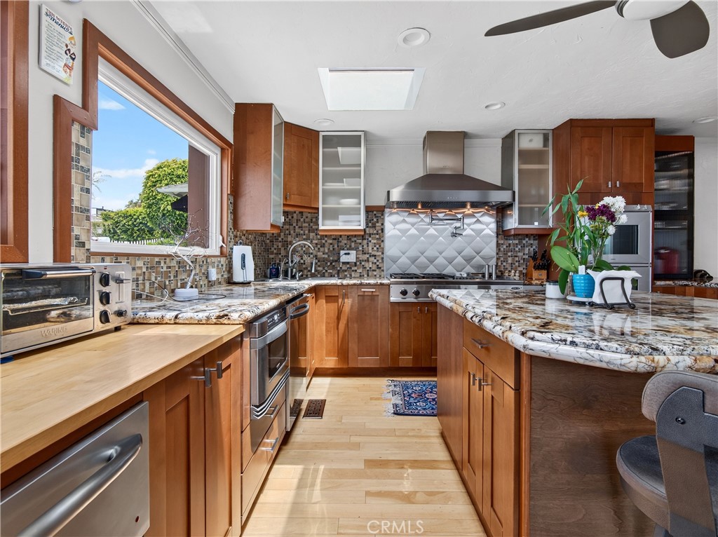 see Full Kitchen Nice floors, island and Granite Countertops - 1080 Noria, Laguna Beach CA 92651 - photo 18