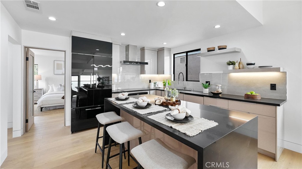 Bright kitchen area with convenient access to the main living spaces - 1095 Miramar, Laguna Beach CA 92651 - photo 19