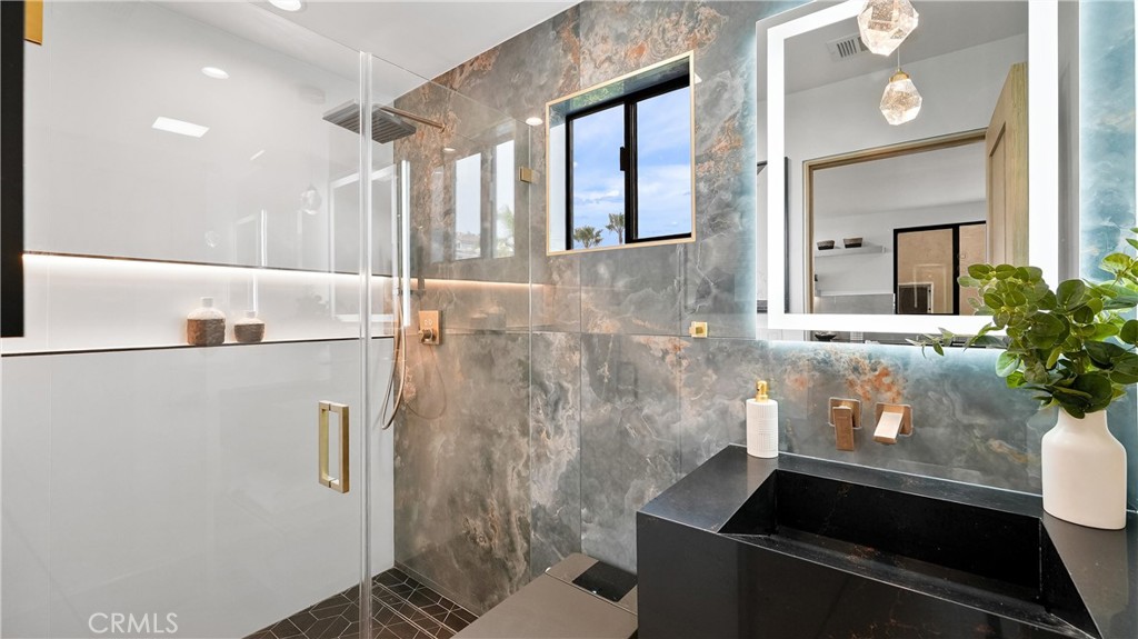 Clean and functional bathroom serving the home with convenience - 1095 Miramar, Laguna Beach CA 92651 - photo 21