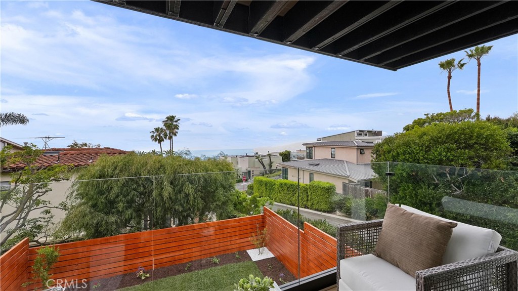 Enjoy the coastal lifestyle from your bedroom with balcony access and ocean and white-water views. - 1095 Miramar, Laguna Beach CA 92651 - photo 34