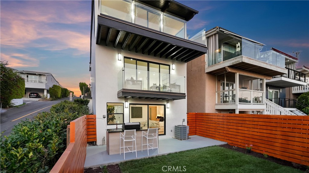Private exterior area featuring a custom-designed BBQ, new landscape, and inviting entertaining space. - 1095 Miramar, Laguna Beach CA 92651 - photo 43