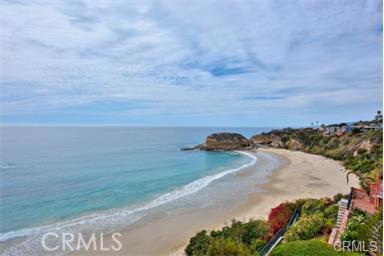 Take a walk down to your own private beach toward the famous Three Arches of this Pristine gorgeous setting. - 11 N Stonington Road, Laguna Beach CA 92651 - photo 1