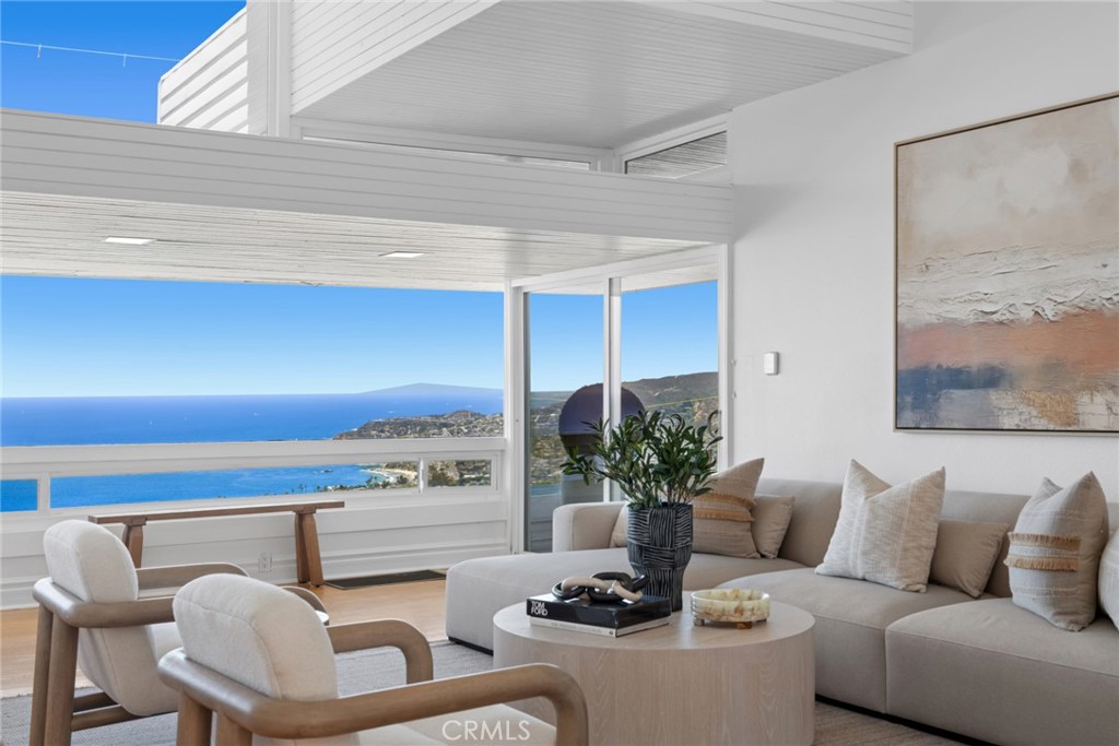 With its distinctive mid-century feel, the floor plan is thoughtfully designed to maximize the absolutely stunning white - 1105 Summit Drive, Laguna Beach CA 92651 - photo 8