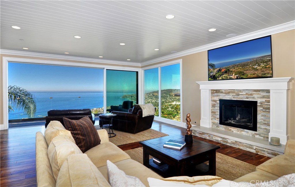 Living Room with panoramic ocean views and fireplace - 1125 Baja Street, Laguna Beach CA 92651 - photo 1