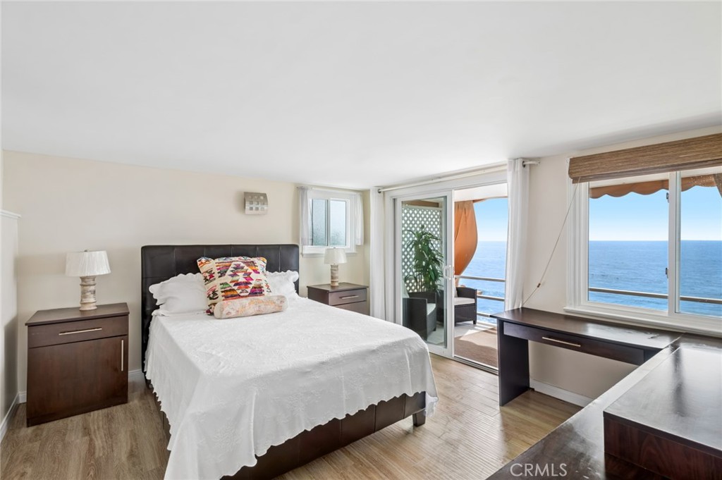 Thoughtfully designed, the home features a generous bedroom with a walk-in closet and a well-proportioned living space o - 1139 Gaviota Drive, Laguna Beach CA 92651 - photo 12