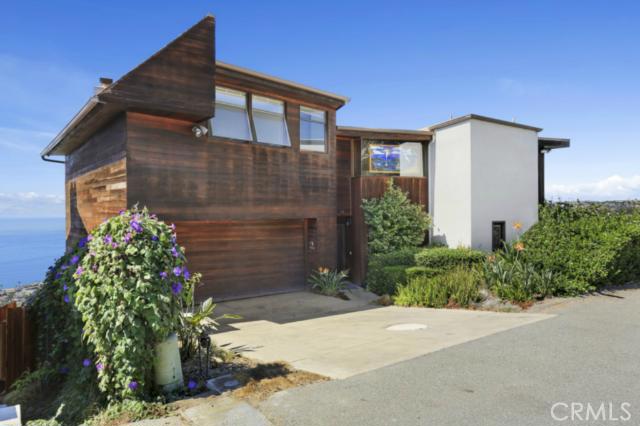 Front view of 1143 Baja Street, Laguna Beach located at the end of a cul de sac. - 1143 Baja Street, Laguna Beach CA 92651 - photo 1