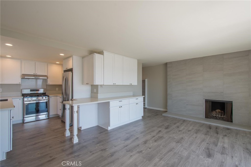 Living area with fireplace - 1166 Gaviota Drive B, Laguna Beach CA 92651 - photo 1