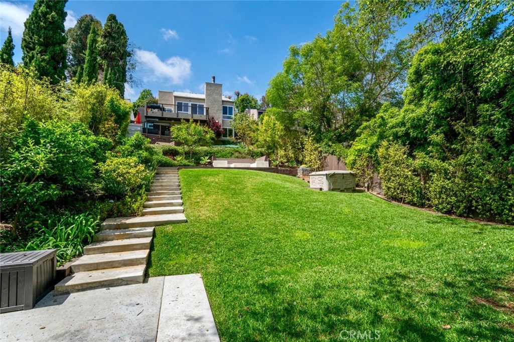 Enormous landscaped lot featuring a built-in fire pit and many fruiting trees. - 1175 Keller Way, Laguna Beach CA 92651 - photo 1