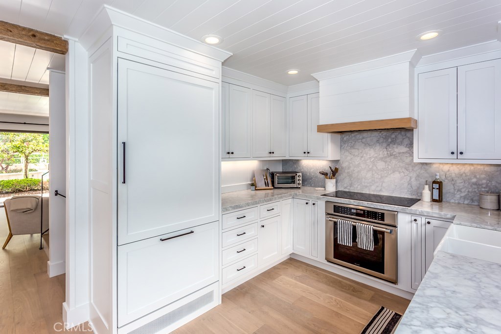 Interior designer owner just finished a stunning renovation highlighted by this incredible kitchen...gorgeous Carrera Ma - 118 Blue Lagoon, Laguna Beach CA 92651 - photo 1
