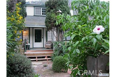 CHARM ARTISITIC PROPERTY - HAS APARTMENT ABOVE LEASED SEPARATELY - SPACIOUS YARD AND HOME GREAT PLANTINGS - 1223 Lower Laguna Canyon Road, Laguna Beach CA 92651 - photo 1