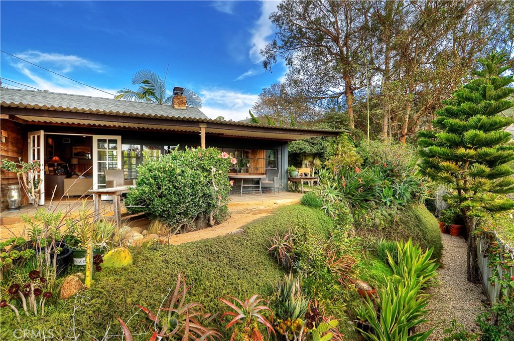 Enjoy the quiet and privacy of this Rancho Laguna home. - 1255 Bluebird Canyon Drive, Laguna Beach CA 92651 - photo 1