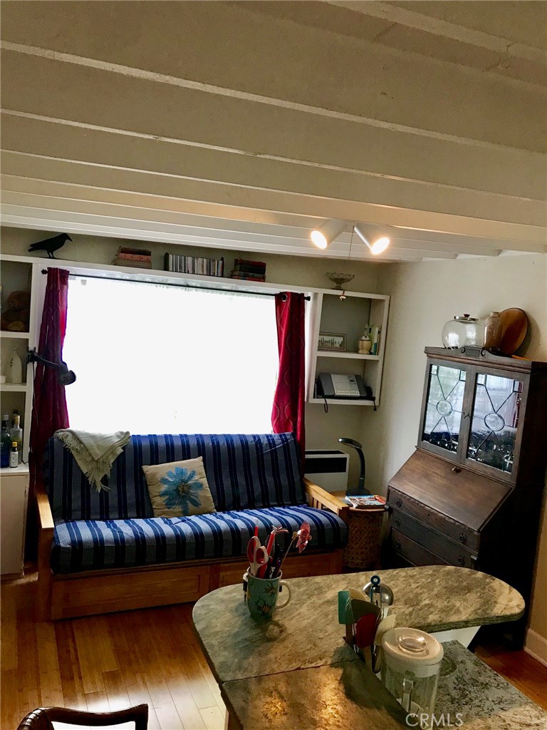 Living room with antiques and a futon bed - 1257 Catalina, Laguna Beach CA 92651 - photo 1