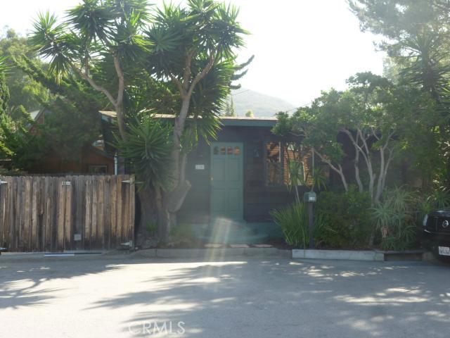 Small lot cottage in Thurston Park. County records indicate original construction in 1939. - 130 Woodland Drive, Laguna Beach CA 92651 - photo 1