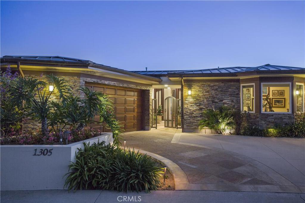 Front of home at dusk. Note the gated entry to front door. - 1305 Bounty Way, Laguna Beach CA 92651 - photo 1