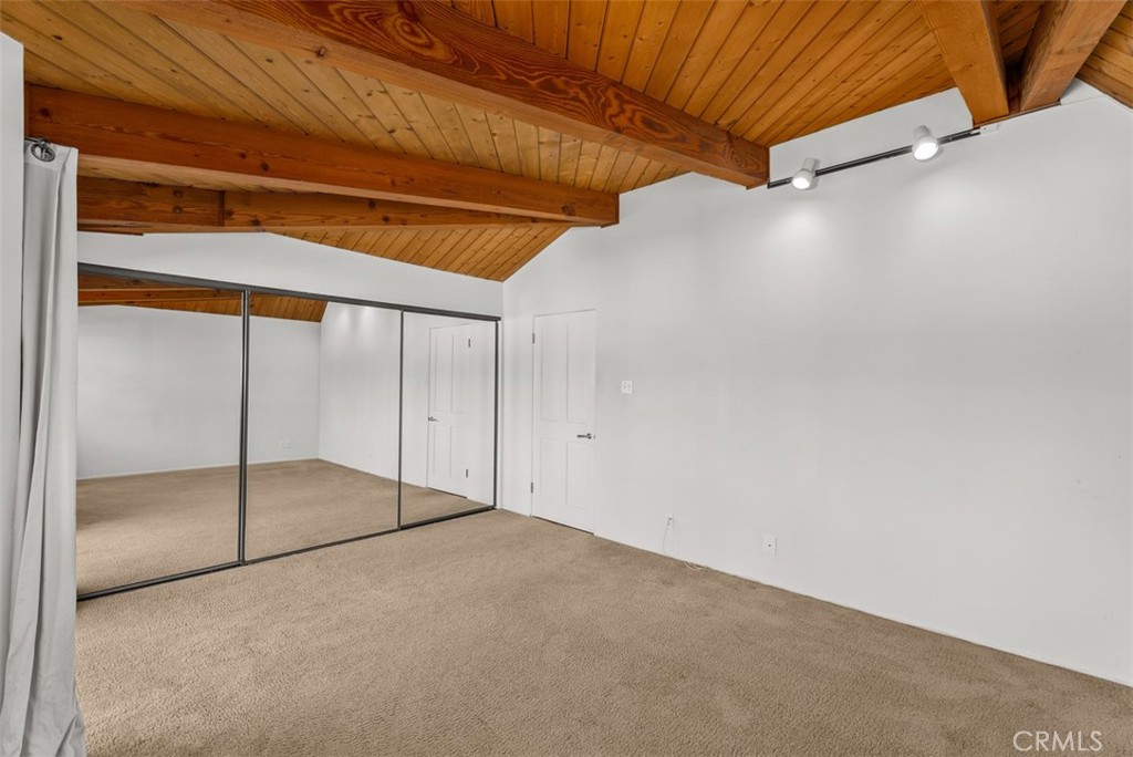 Spacious bedroom with beamed ceilings - 1325 La Mirada Street, Laguna Beach CA 92651 - photo 28