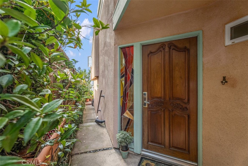 Private entry with stained glass accent window - 1325 La Mirada Street, Laguna Beach CA 92651 - photo 31