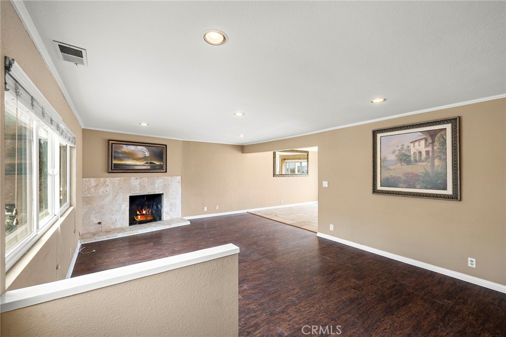 the home spans approximately 3200 square feet and features four bedrooms plus a lower-level bonus room or potential moth - 1337 Terrace Way, Laguna Beach CA 92651 - photo 3