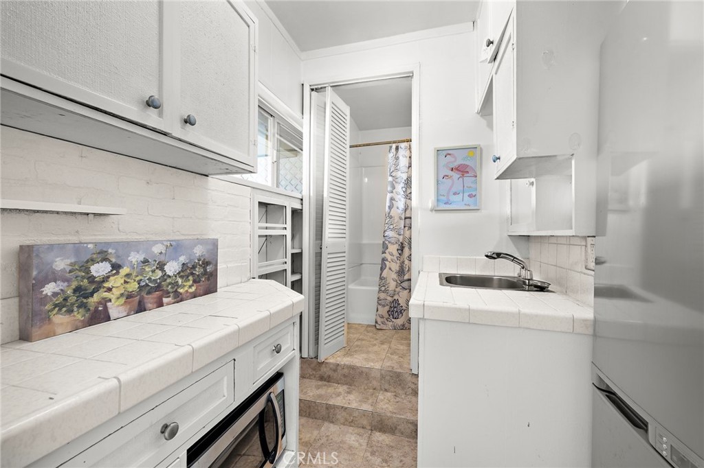 Lower level bath and kitchenette - 1337 Terrace Way, Laguna Beach CA 92651 - photo 23