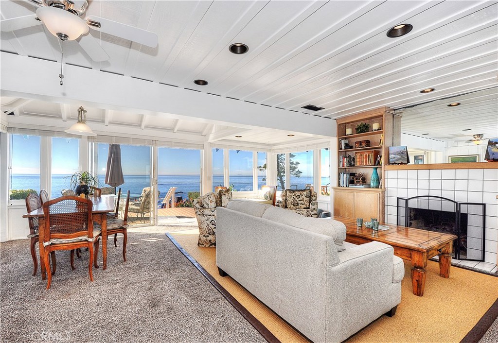 Living/dining area opens to multiple decks, ocean views, and steps to the beach. - 1369 Gaviota Drive, Laguna Beach CA 92651 - photo 1