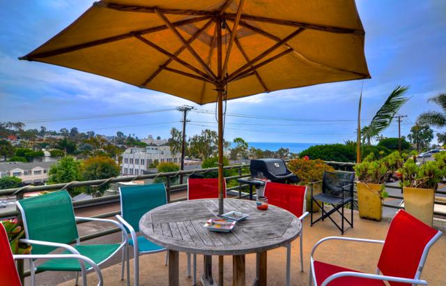 Large deck off the penthouse and ocean/canyon views. - 146 Cliff Drive, Laguna Beach CA 92651 - photo 1
