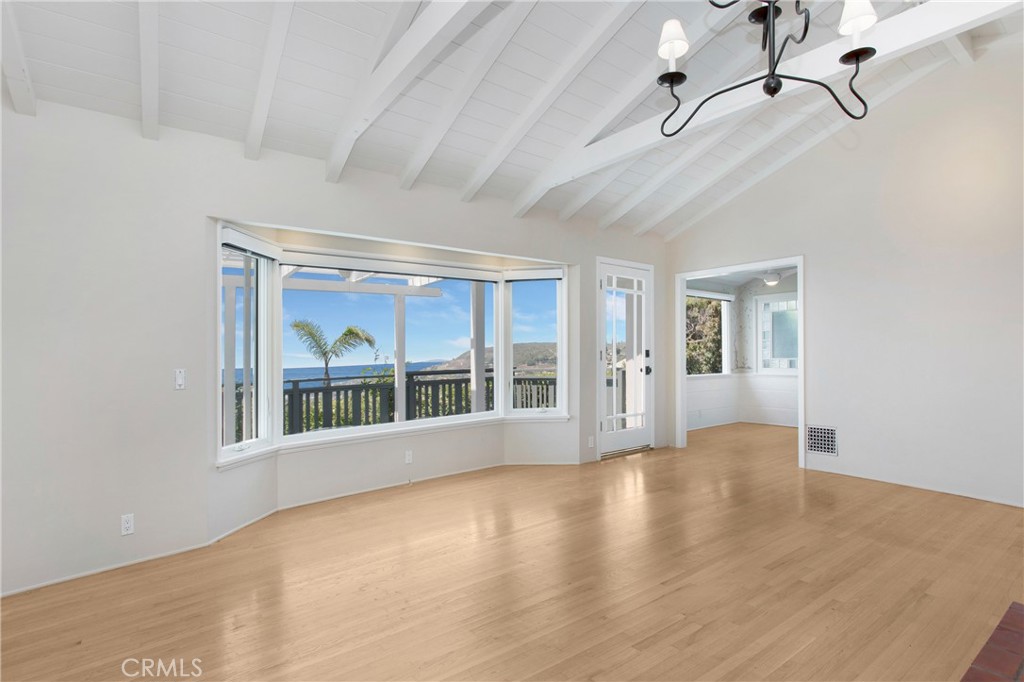 Spacious living room with ocean and city lights views - 1476 Temple Hills Drive, Laguna Beach CA 92651 - photo 1