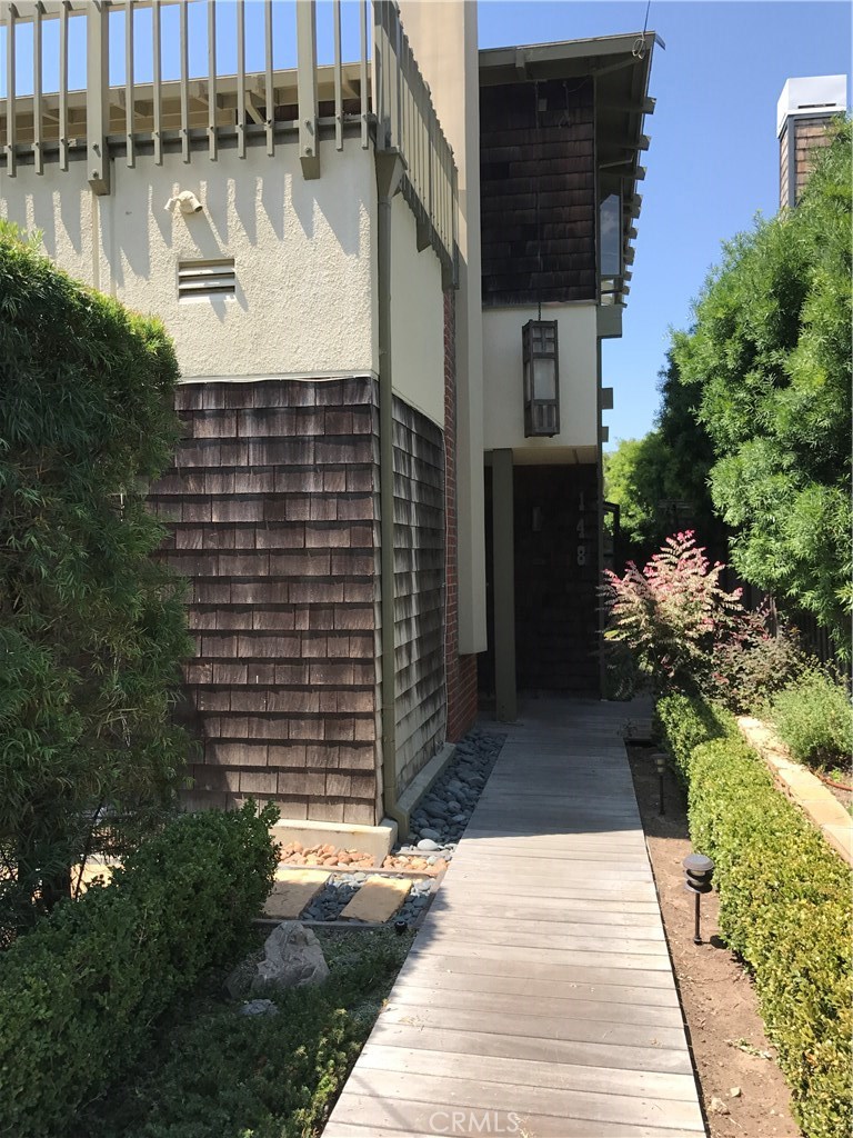 The front of house--path to the front door from Chiquita street - 148 Chiquita Street, Laguna Beach CA 92651 - photo 1