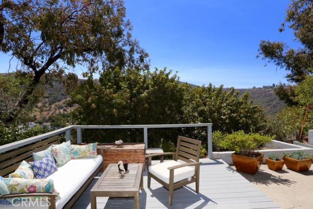 Spacious outdoor patio with ocean view and canyon views. - 1486 Morningside Circle MAIN, Laguna Beach CA 92651 - photo 1