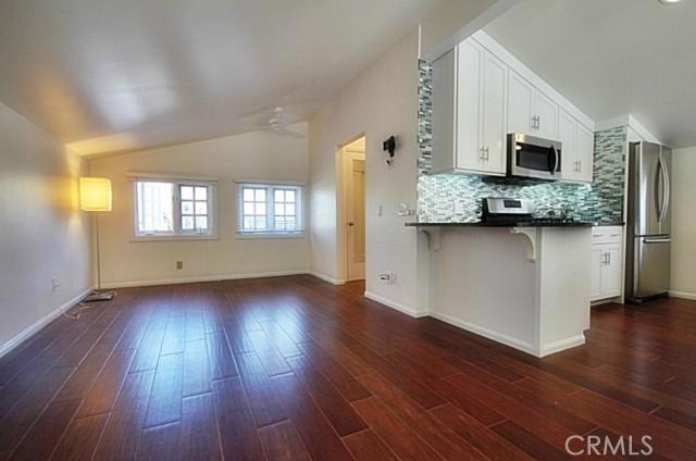 "Cherry wood" ceramic tile flooring throughout - 1486 Morningside Circle STUDIO, Laguna Beach CA 92651 - photo 3