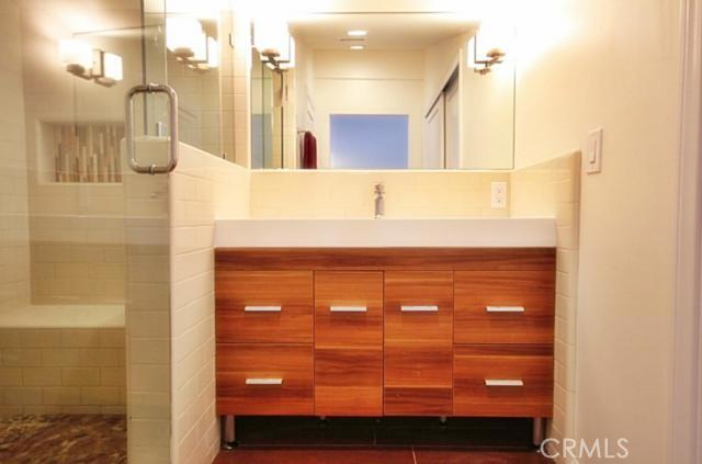 Large bathroom sink with custom cabinetry - 1486 Morningside Circle STUDIO, Laguna Beach CA 92651 - photo 10