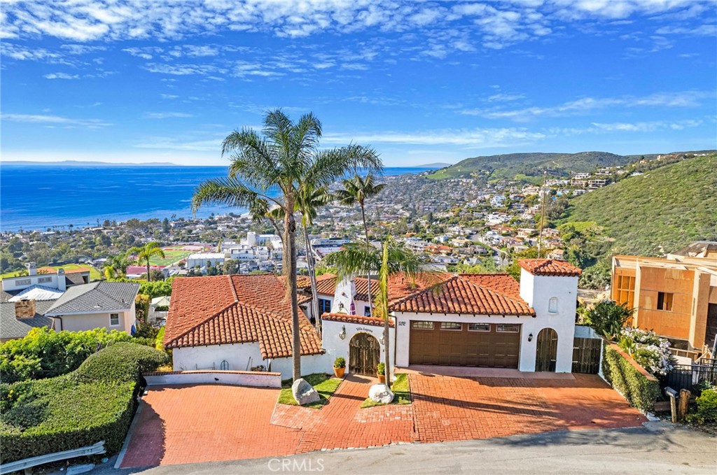 Drone photo showing exterior front and view. - 1492 Temple Hills Drive, Laguna Beach CA 92651 - photo 1