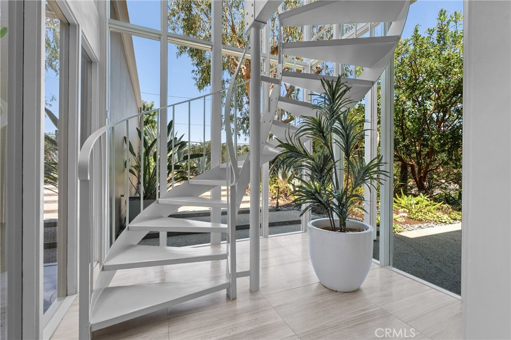 stairs to upstairs with two rooms and deck - 1494 Bluebird Canyon Drive, Laguna Beach CA 92651 - photo 24