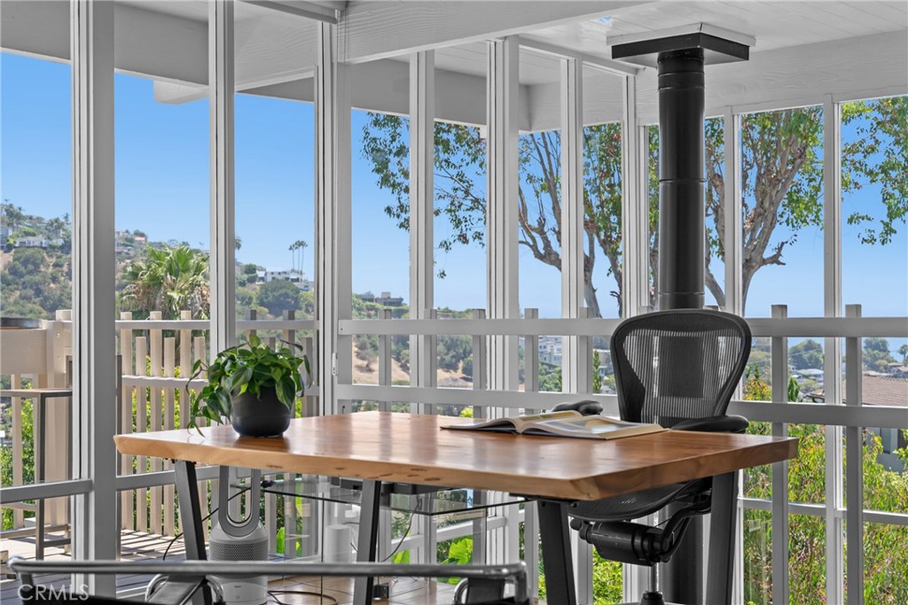 loft with access to upper level deck currently furnished as an office - 1494 Bluebird Canyon Drive, Laguna Beach CA 92651 - photo 32