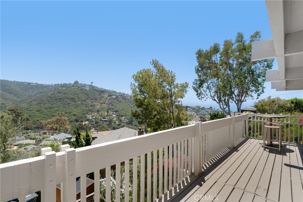 upper level deck accessible by both rooms - 1494 Bluebird Canyon Drive, Laguna Beach CA 92651 - photo 33