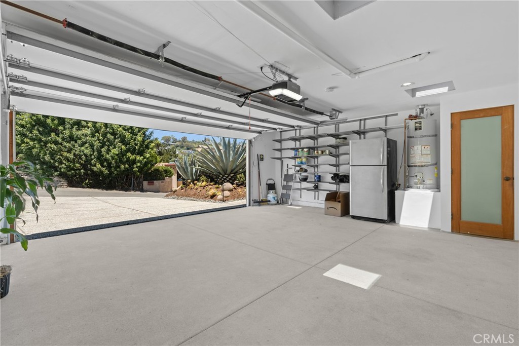 2 car garage (with a qtr bathroom) - 1494 Bluebird Canyon Drive, Laguna Beach CA 92651 - photo 38