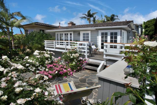 Colorful gardens, hardscape, ample decks and French doors create the ultimate in indoor and outdoor living - 15 S La Senda Drive, Laguna Beach CA 92651 - photo 1