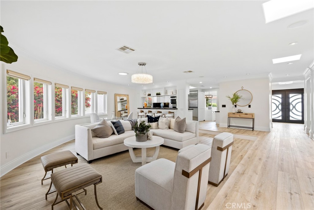 Stepping into luxury, this three-bedroom, two-and-a-half bath home is appointed with only the finest materials and top-o - 1500 Caribbean Way, Laguna Beach CA 92651 - photo 1