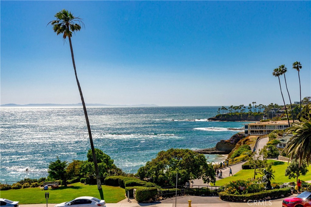 Ocean and Heisler Park View from the condo. Vehicles are parked along Cliff Drive. - 151 Myrtle Street 10, Laguna Beach CA 92651 - photo 1