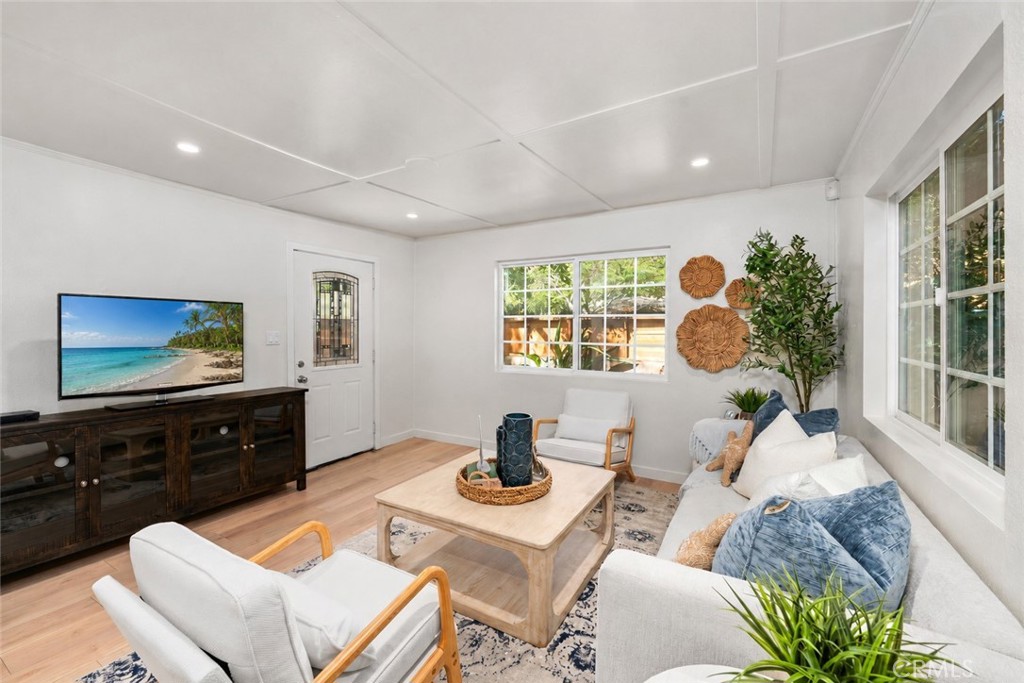 living room -tv digital enhanced - 1535 Arroyo Dr, Laguna Beach CA 92651 - photo 6