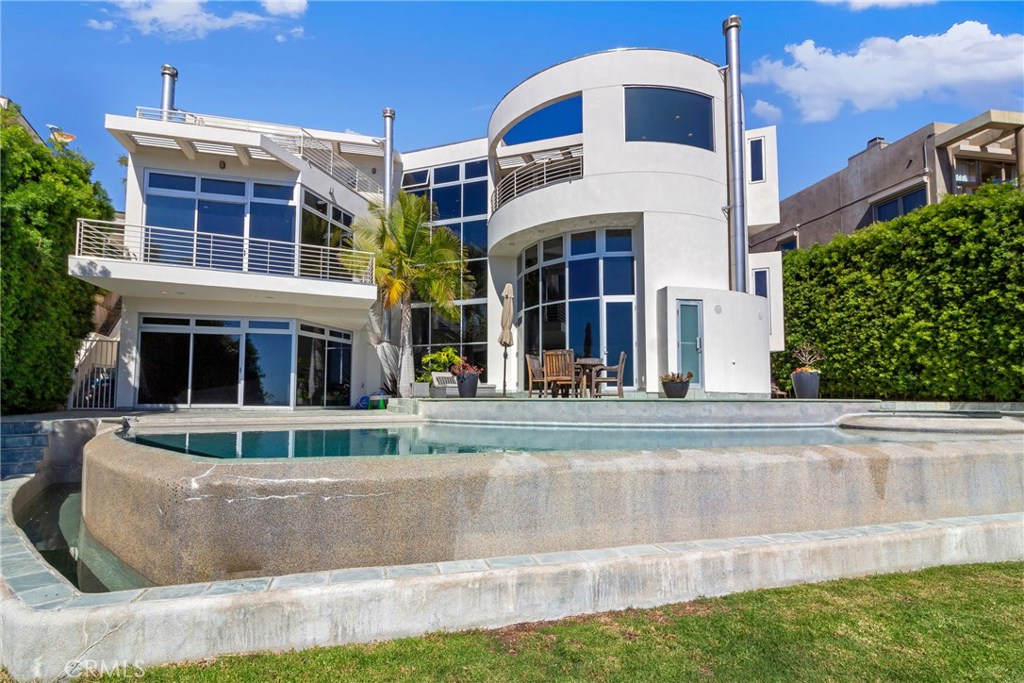 Exterior back viewing the home from backyard. - 1539 Tahiti Avenue, Laguna Beach CA 92651 - photo 1