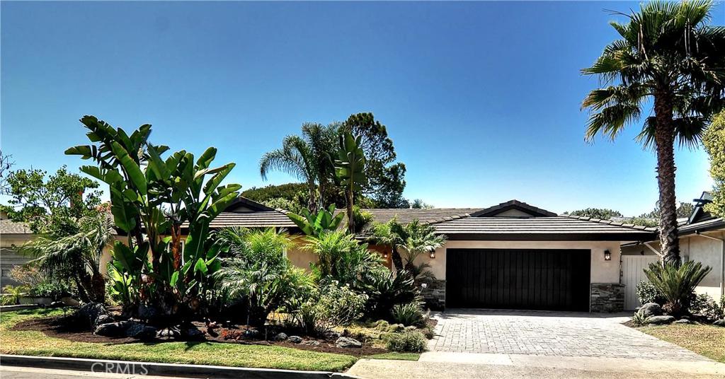 Gorgeous Crown Point home with new plastered exterior and custom stacked stone. Custom lighting and landscaping. - 156 Mcknight Drive, Laguna Beach CA 92651 - photo 1