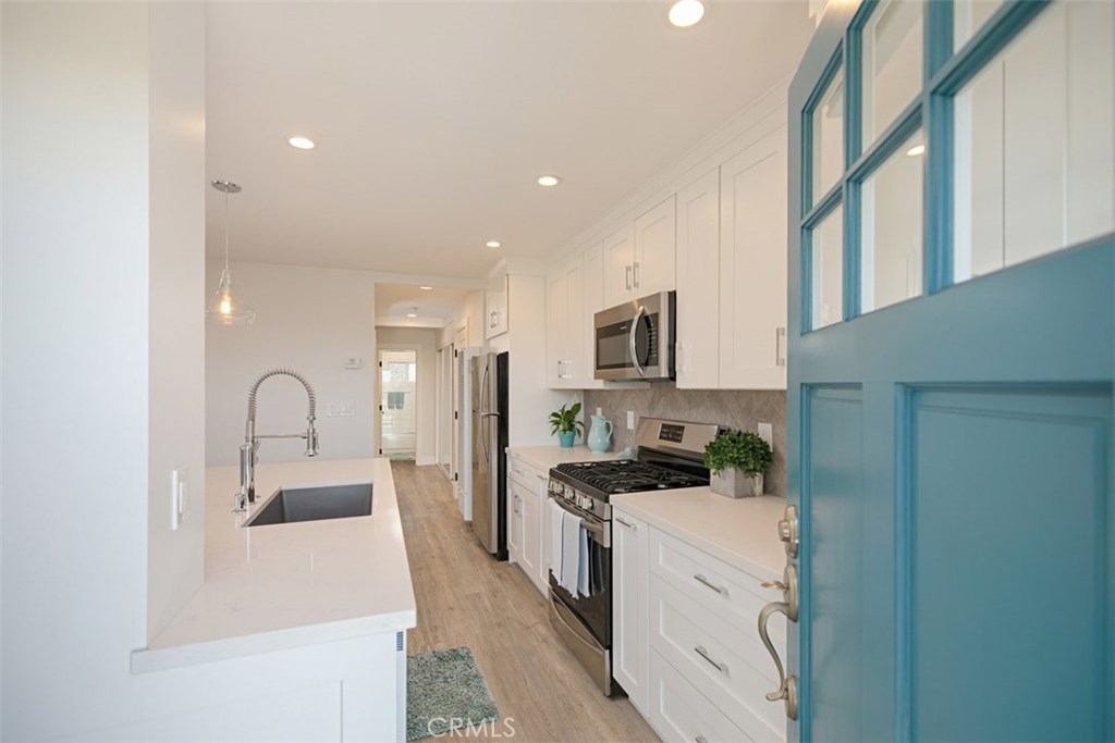All units have been updated with designer finishes throughout. - 1566 Glenneyre Street, Laguna Beach CA 92651 - photo 1