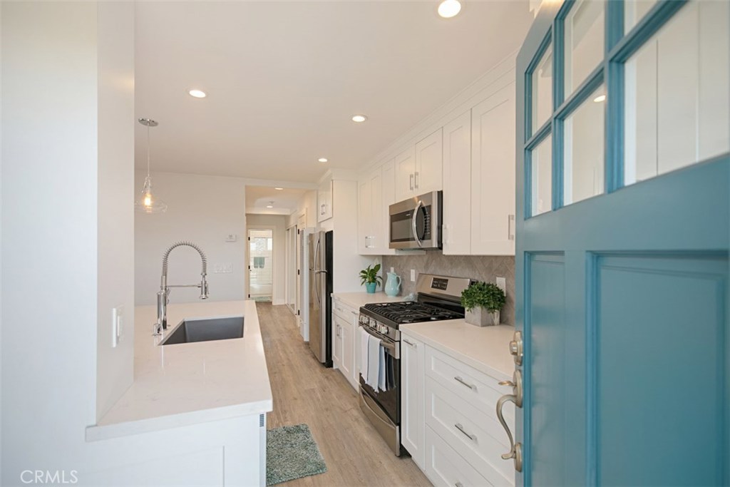 All units have been updated with designer finishes throughout. - 1566 Glenneyre Street, Laguna Beach CA 92651 - photo 1